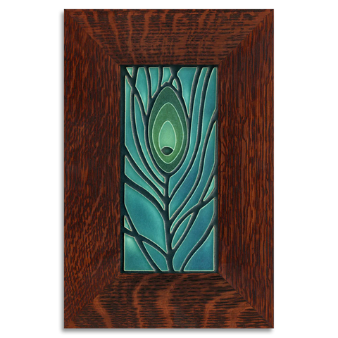 Framed Motawi ceramic tile with blue peacock feather design