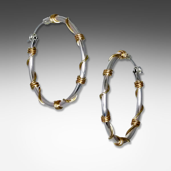 Sterling silver hoop earrings wrapped with gold wire by Suzanne Q Evon