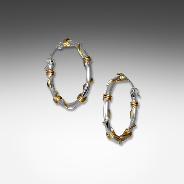 Sterling silver hoop earrings wrapped with gold wire by Suzanne Q Evon