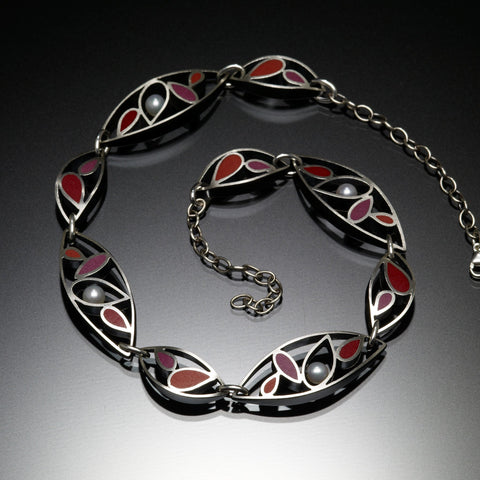 Silver marquis necklace with red inlays by Susan Kinzig