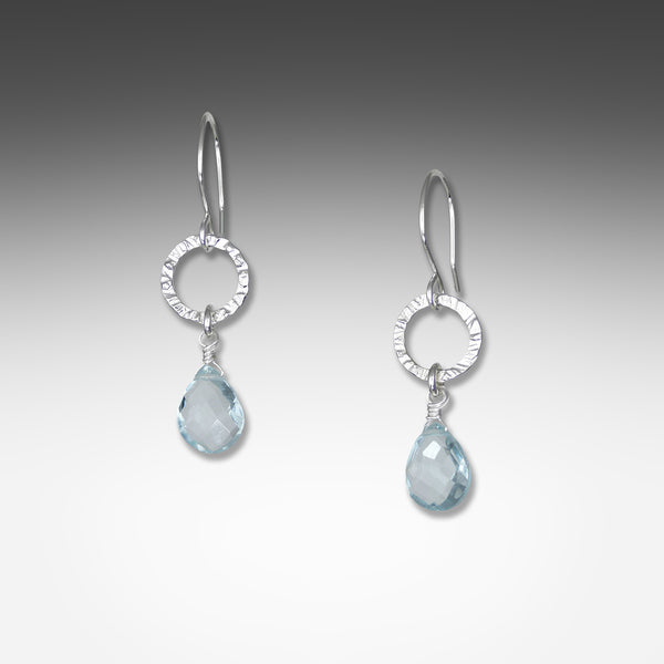 Blue topaz earrings on small hammered hoop by Suzanne Q Evon