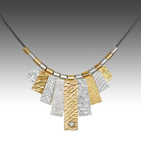 Mixed metal textured tab Cleopatra necklace by Suzanne Q Evon