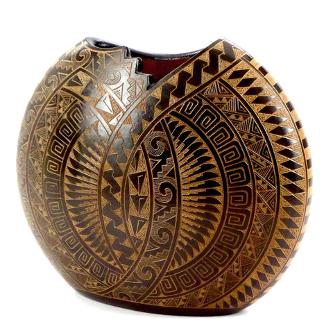 Ceramic upright disc vessel with hand-cut geometric design