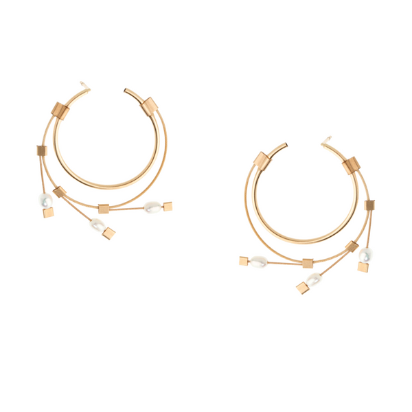 Endless spring hoop earrings in gold and pearls by Meghan Patrice Riley