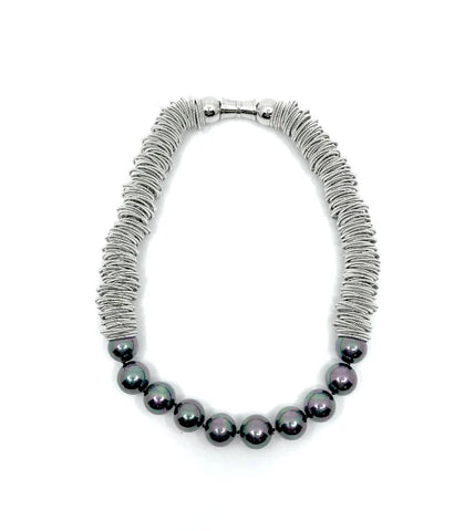 Necklace with silver rings and black mother-of-pearl beads