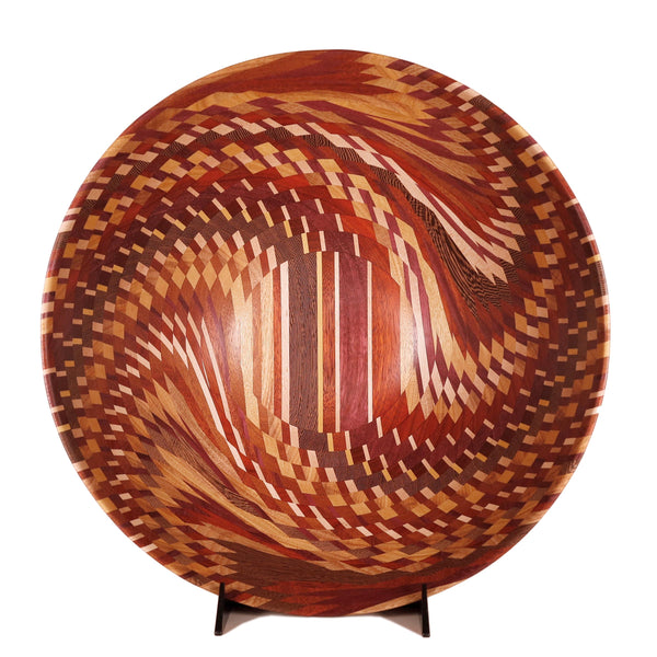 One-of-a-kind heirloom bowl in 16 tiers of swirling wood patterns