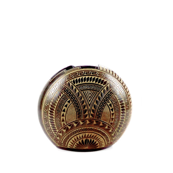 Ceramic upright disc vessel with hand-cut geometric design