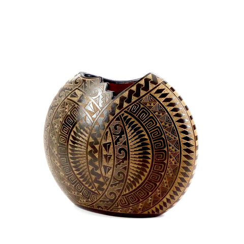 Ceramic upright disc vessel with hand-cut geometric design