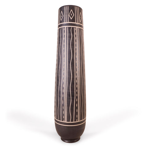 Tall ceramic vase with geometric markings