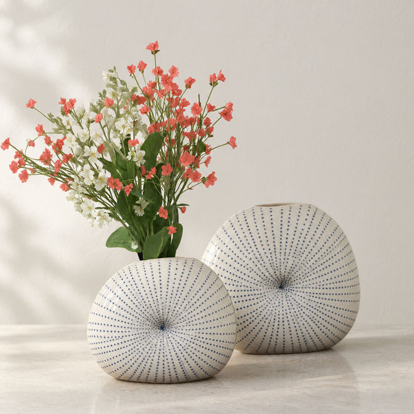 Ceramic freeform disc vase with blue dotted pattern