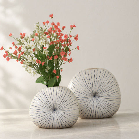 Ceramic freeform disc vase with blue dotted pattern