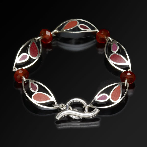 Silver marquis bracelet with red inlays by Susan Kinzig
