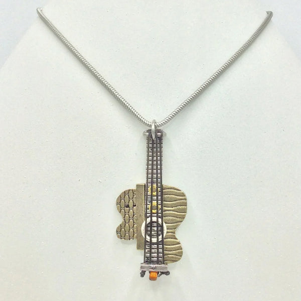 Steampunk Picasso guitar necklace
