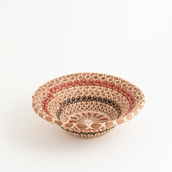 Flared round pine needle basket with dyed and undyed raffia
