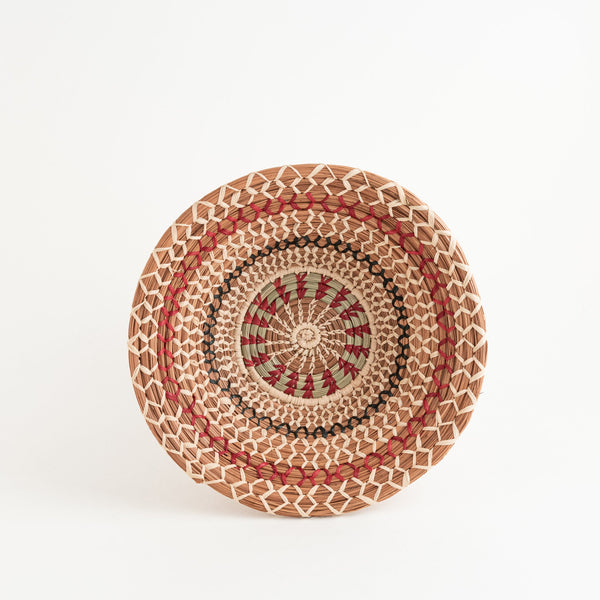 Flared round pine needle basket with dyed and undyed raffia