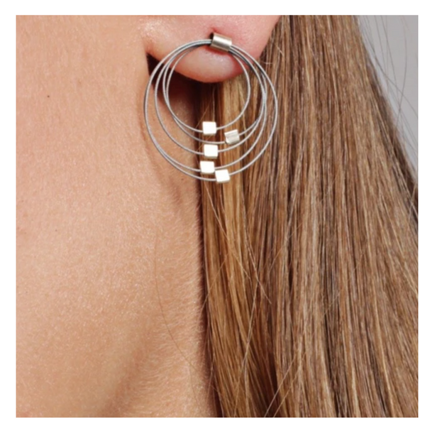 Graduated circle post earrings by Meghan Patrice Riley