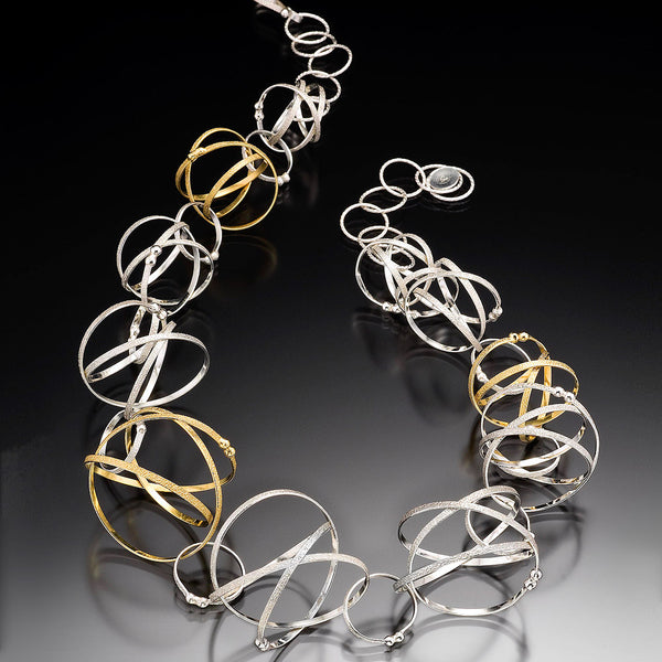 Kathleen Maley silver and gold vermeil graduated Mobius charms necklace