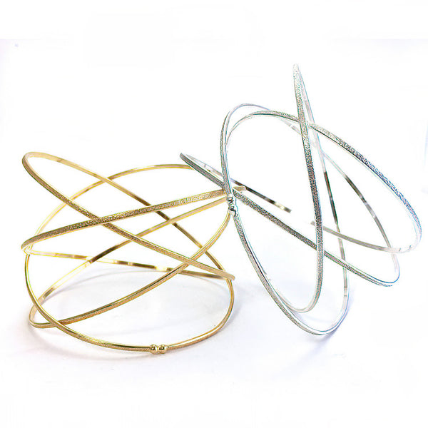 Kathleen Maley gold vermeil crossing textured bands orbit bracelet