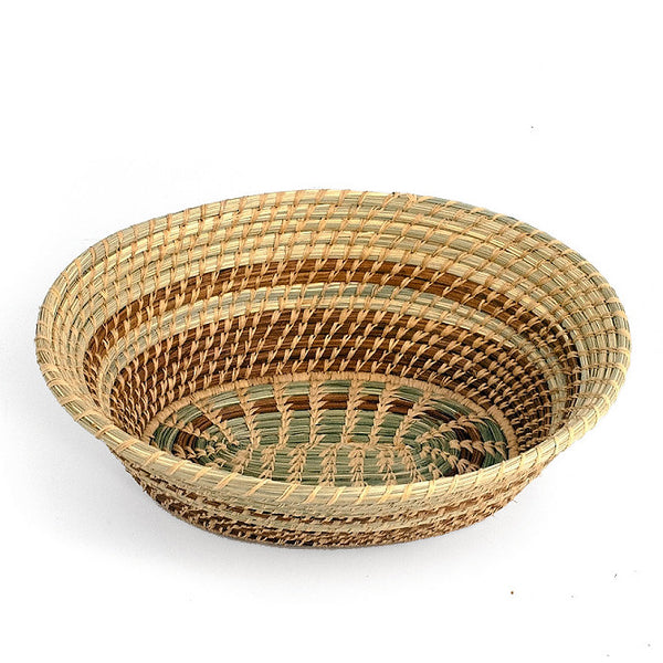 Oval pine needle basket with green wild grass