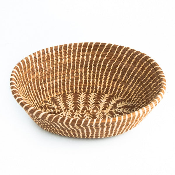 Oval pine needle basket with raffia