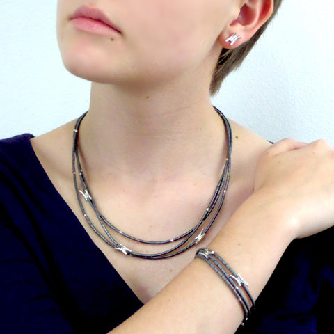 Black hematite beads and silver charms bracelet