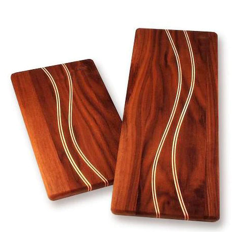 Walnut cutting boards with curved inlays